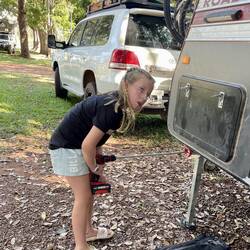 Millie at work, drilling the legs down