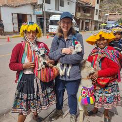 If you stop too long, you find yourself posing with a baby alpaca...