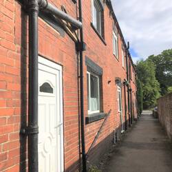 Notice the plumbing on the outside of the homes!