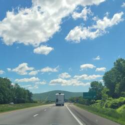Beautiful skys to start our day of driving. We always have this same camper in front of us?