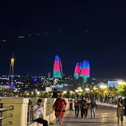 Flame towers flaming and glowing at night