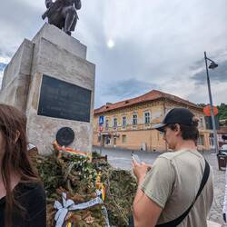 Eli diligently typing in the Romanian to translate it. Just the names of the donors.