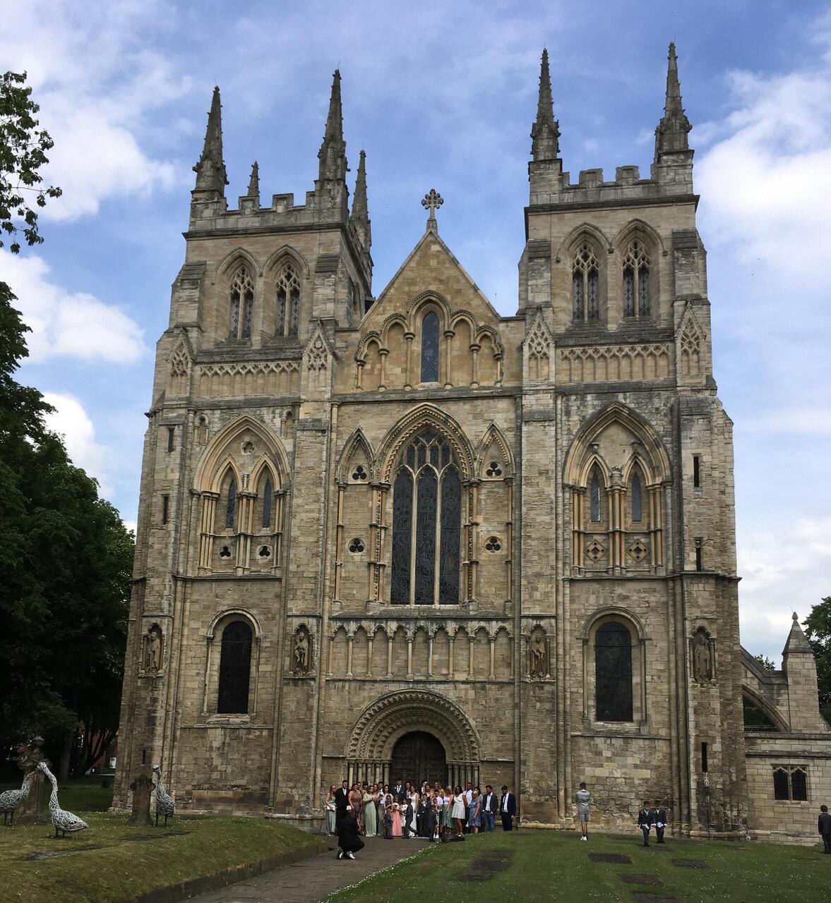 The Abbey Church, with a wedding party