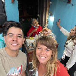 The old lady sells us sweets