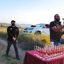 The pilot & navigator opening champagne