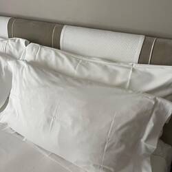 Towels on the hesdboard so you aren't resting uour head on something dirty