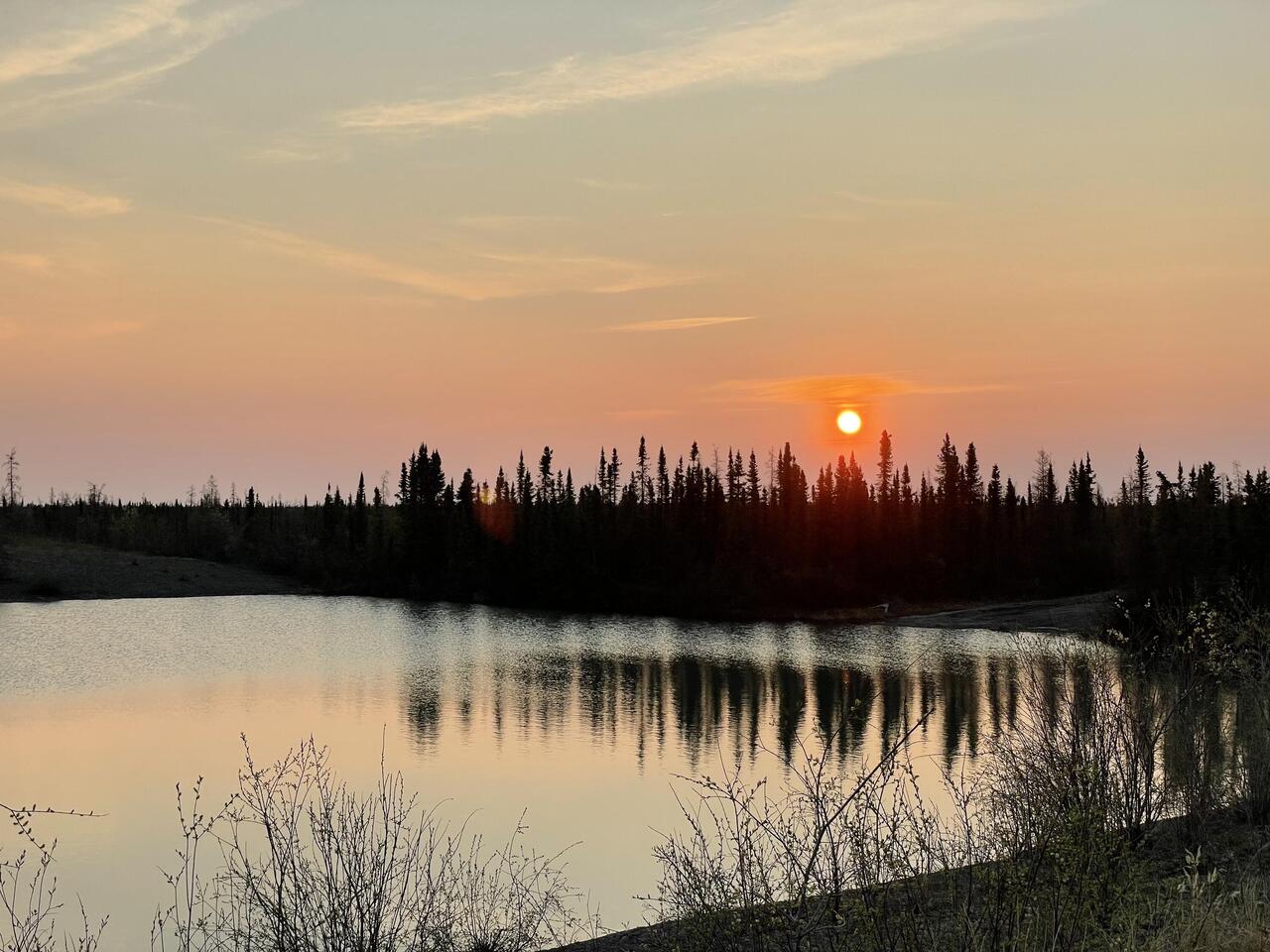 The sun close to it's lowest point on the horizon.