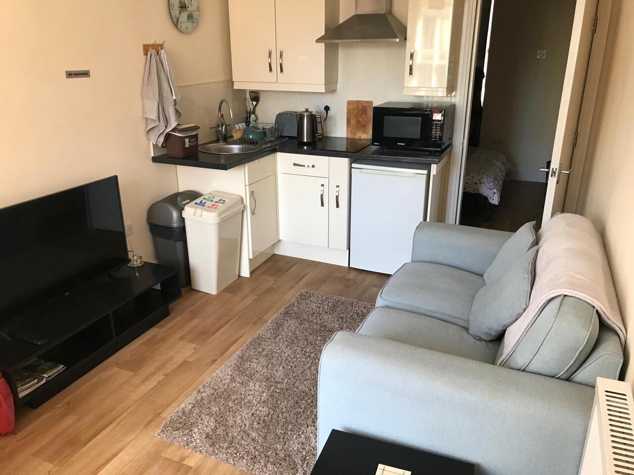Sofa and kitchenette
