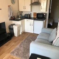 Sofa and kitchenette