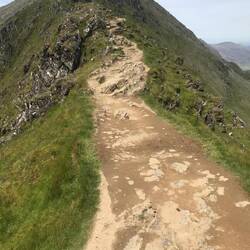 Arête quite high up the mountain. Hundreds of feet of sheer drop either side