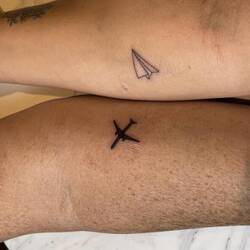 Small Airplanes! To represent our journey. Jordan's is the paper airplane, mine the jet