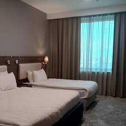 Hotel for a night. Again, overkill for 1 pax. A double + a single bed.