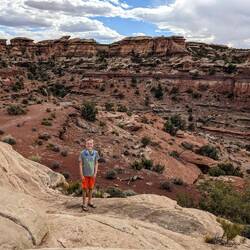 He was ready to hike, headphones & flip flops & all.