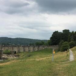 All the houses have stairs leading from their back gardens to the path