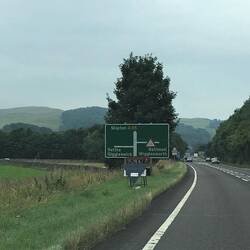 Note the names of the towns on the sign!