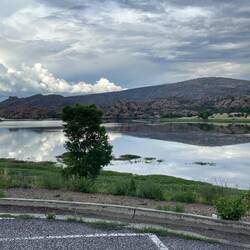 Tiny lake for paddleboarding on edge of town.