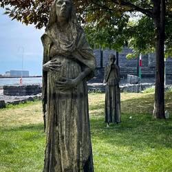 Two of the statues that commemorate those who fled the Great Famine ... Ireland Park — Toronto, ON.