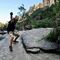 Brax, slide time - the kids loving the sandy, slippery rocks