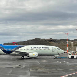Don't see the polar bear? Take another look at the tail of the airplane! — Iqaluit, Canada.