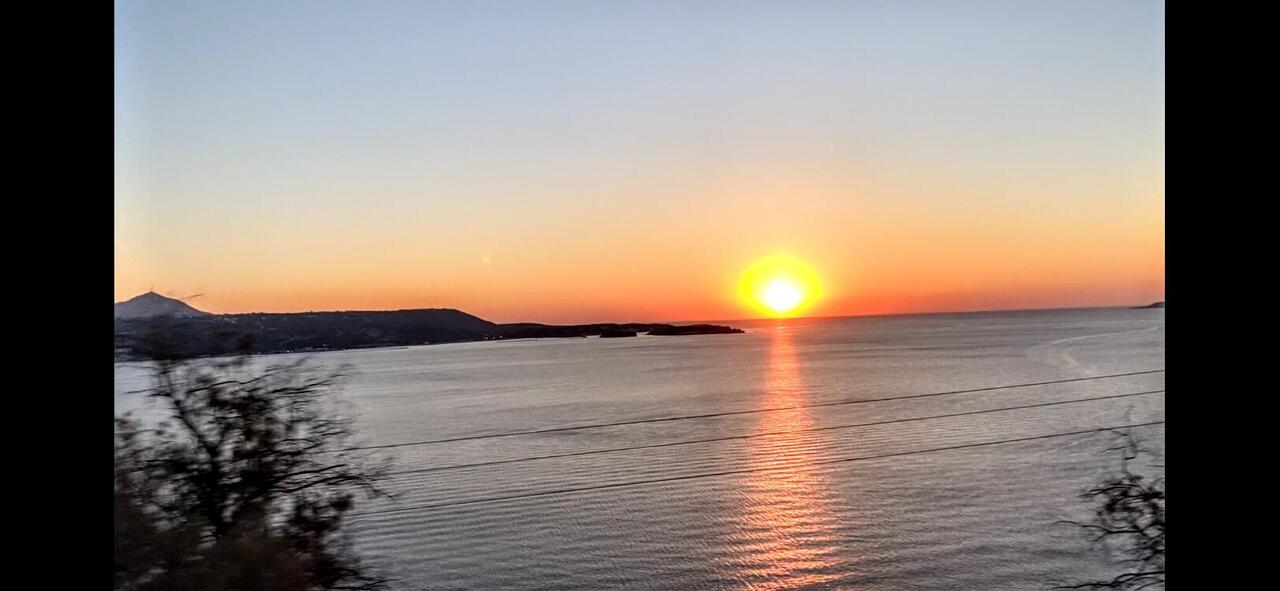 Sunset over the Aegean sea from the bus