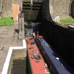 Two canal boats going up the locks