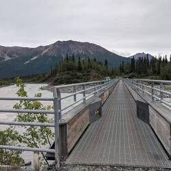 Footbridge takes us to the van that will drive us 30 minutes to Kennicott