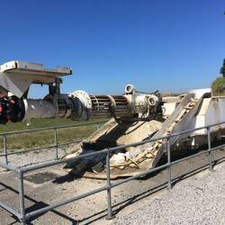 The Roadheader, used to cut new tunnels, move the rock, and as a platform for setting roof supports.