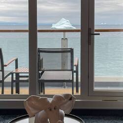 Sighting of an iceberg from the cabin while I listen to a lecture being streamed from the theater.