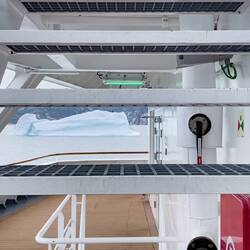 Mother Nature's ice sculpture between the open risers as I head up to deck 6 — Disko Bay, Greenland.