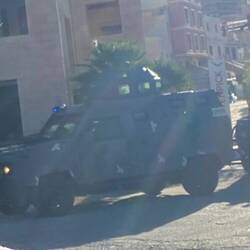 Four military vehicles parked near our hotel - a constant reminder of where we really are