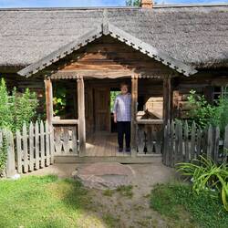 Marilyn on the porch of the Aukštaitija farmhouse