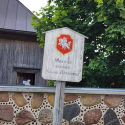 A sign in small "Rumškiai town"