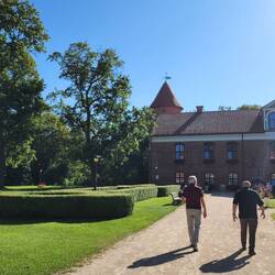 Gintas and Scott walking to the Raudondvaris Manor Castle