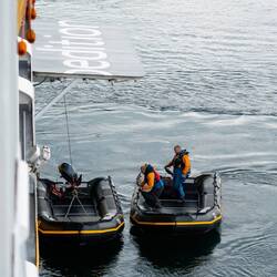 The zodiacs are being readied ... time to ready ourselves — Navy Board Inlet.
