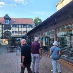 Scott, Joanne, and Gintas near German style buildings in Klaipėda