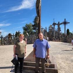 Marilyn and Scott in front of The Hill of Crosses
