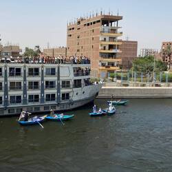 Rowboats were surrounding us just like this other boat