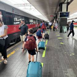 Rolling through the train station in Rome about to catch our fast train to Naples