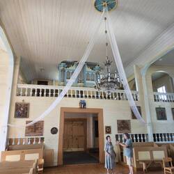 Anastacija and Vincas Talking in the Back of St. Anne's Church with the Old Organ Above