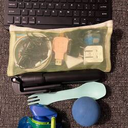 Travel keboard, chargers etc,selfie stick, spork, water bottle and foot roller ball