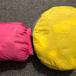 Clothes (yellow bag), lightweight but bulky fleece (pink bag)