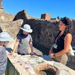 playing a game to figure out which foods were available in Pompeii