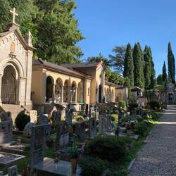 Small cemetary with photos of the deceased.