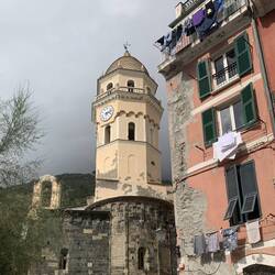 Margherita di Antiochia Church next to dilapidated building with laundry