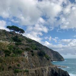 Lady Madonna, white church at the top of the hill, barely visible from the shore