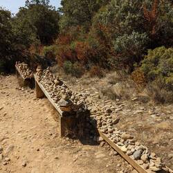 Dozens of rock cairns