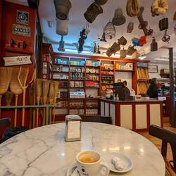 Second coffee in cute little-bit-of-everything cafe bar store