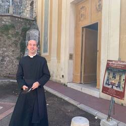 Friendly pastor paused to chat