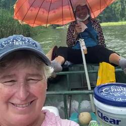 Boat ride up Ngo River - they must have abs of steel!