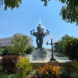 A rest in the botanical gardens, infront of a fountain designed by Gustave Eiffel